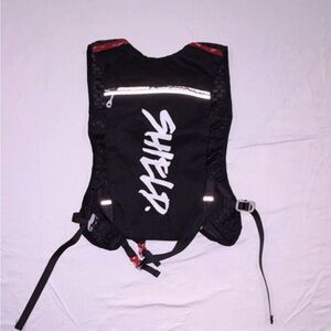 SHIELD Black Hydration Pack with Reflective Accents, 3 Pockets, Adjustable Size